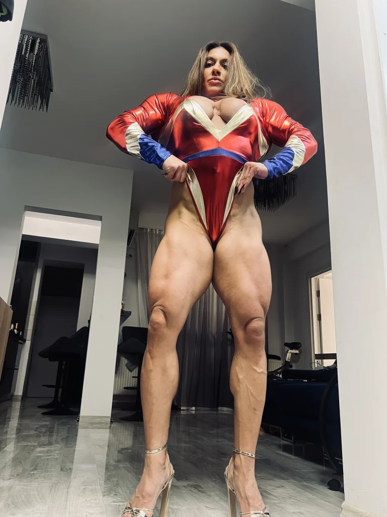 Nina Muscle Muse posing for the Giantess and Powerplay category on FBB Vixens.