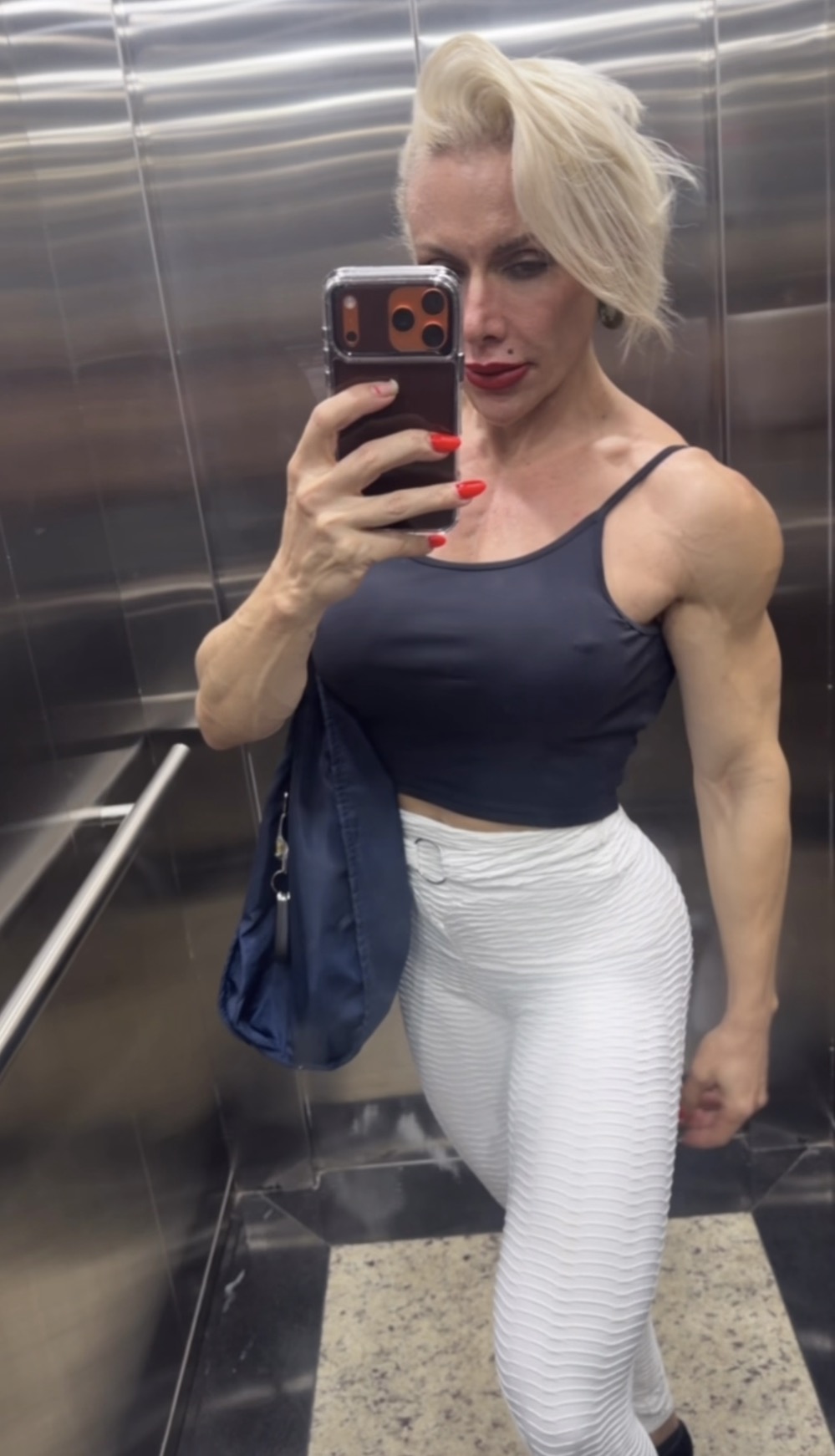 muscle worship San Antonio Texas — elite female bodybuilder FBB session Alamo City