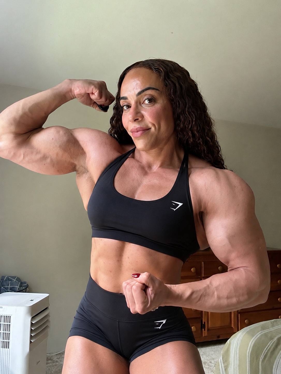 female bodybuilder flexing for muscle worship session — FBB muscle worship USA girls with muscle female bodybuilder sessions girlswithmuscle